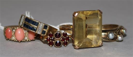 Five assorted 9ct gold and gem set dress rings.
